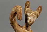 UEA 407 - Dancing female tomb figure, China